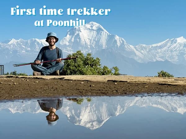 First-time trekker at Poon Hill viewpoint in Nepal