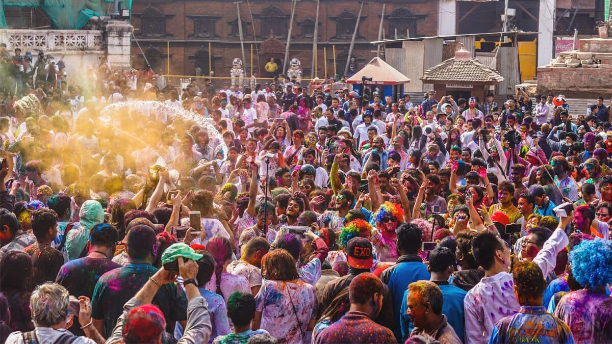 People celebrating holi festival in Banantapur, Nepal