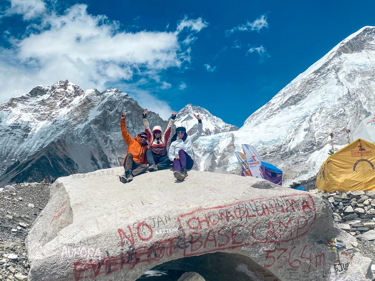 Sitting on the iconic rock at Everest Base Camp