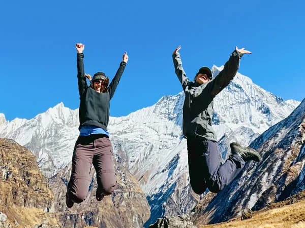 Trekkers Celebrating At Annapurna Base Camp